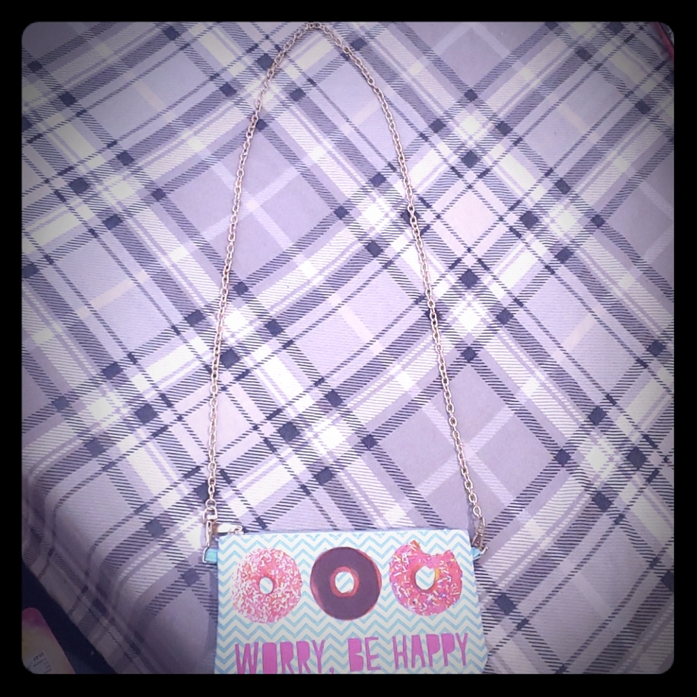 Doughnut purse w/portable charger.